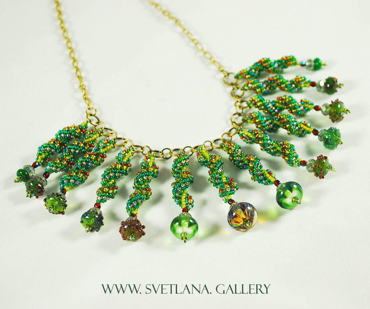 Christmas Necklace featuring handmade glass beads and bead-woven components made by Svetlana