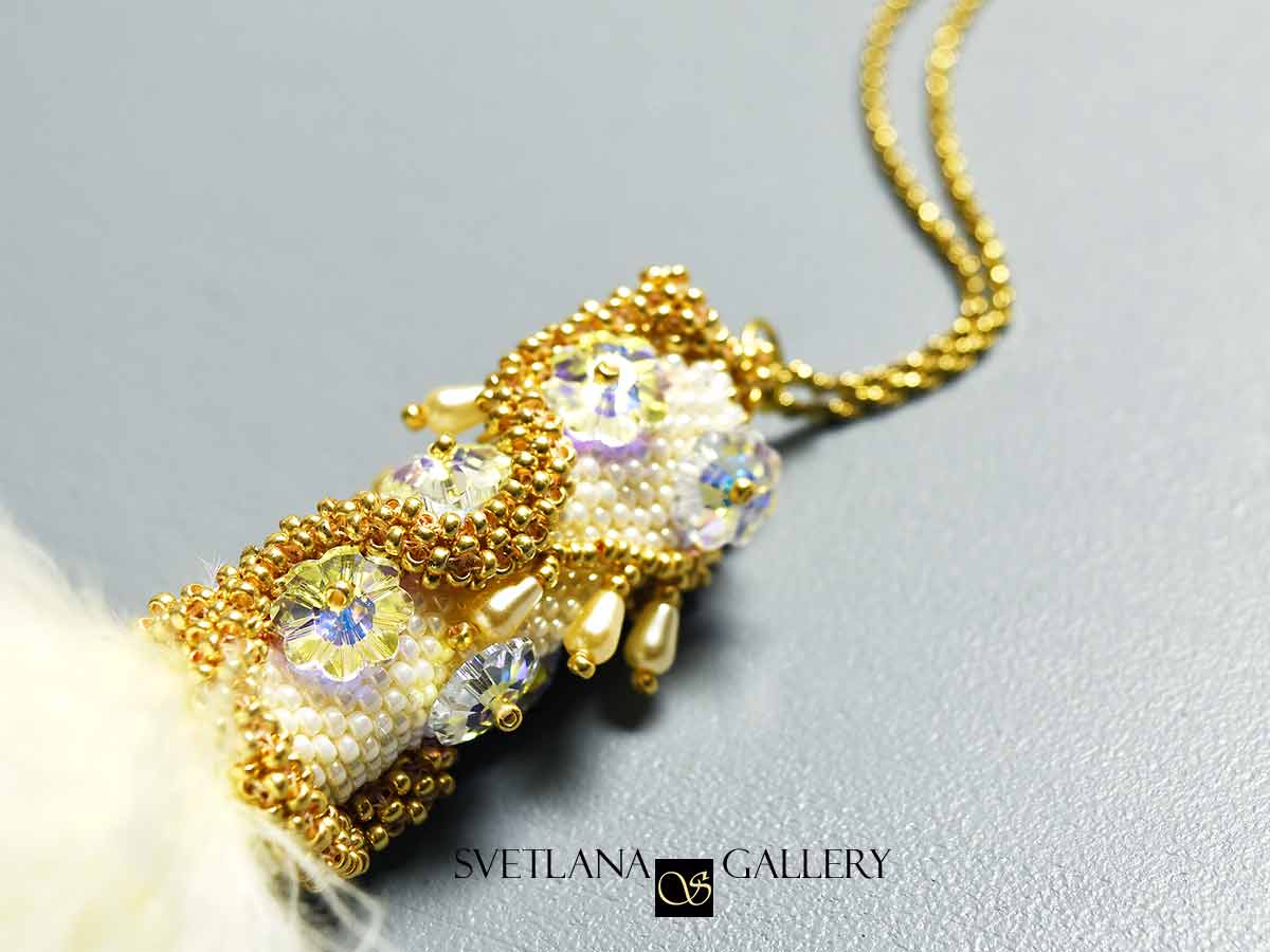 White Feather Beaded Pendant